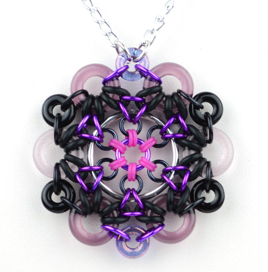 Space Oddity Pendant by Kat Wisniewski using glass rings and rubber rings