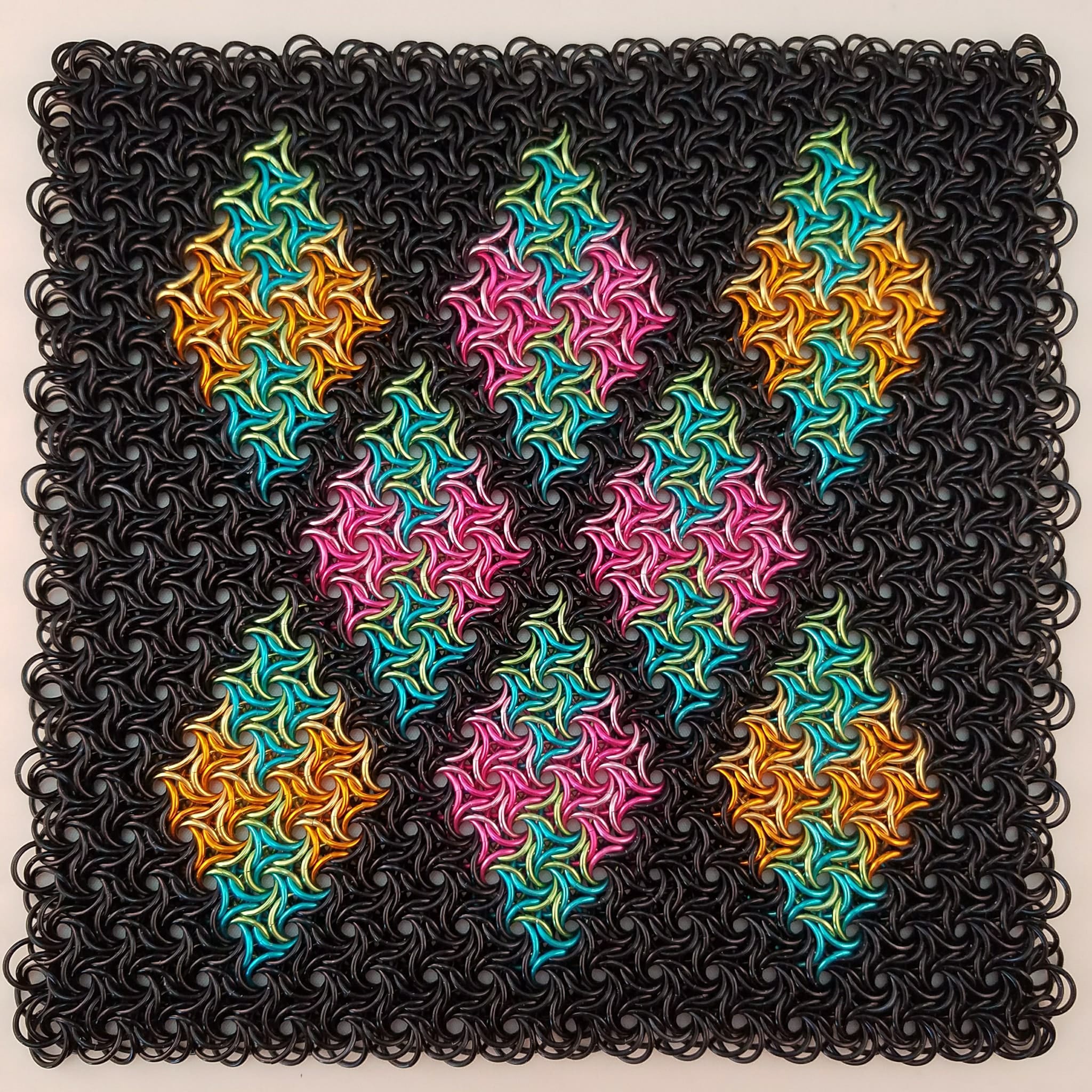 Black square of moorish rose with colorful diamond shaped inlay