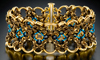 Chainmaille Japanese Cross Cuff in jewelry brass and enameled copper by Rebeca Mojica