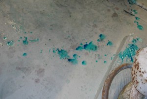 drips of anodized dye on floor
